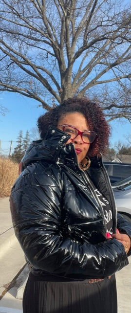 ግልጽነት፡ ከርክም Puffer ጃኬት