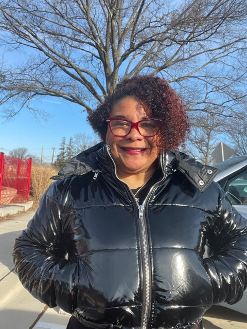 ግልጽነት፡ ከርክም Puffer ጃኬት